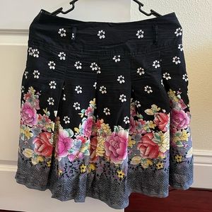 3 for $20 - Black midi skirt with floral pattern.